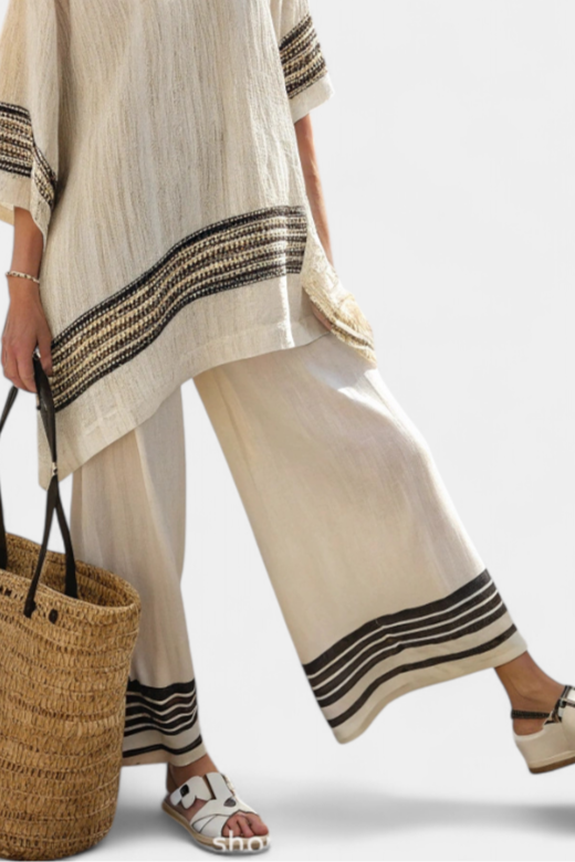 Mariella – elegant black striped linen top and fluid trousers