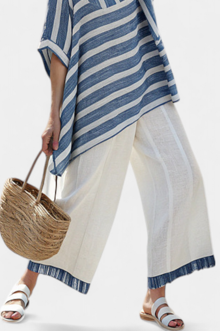 Ornella – sophisticated blue striped top and trousers with details at the bottom
